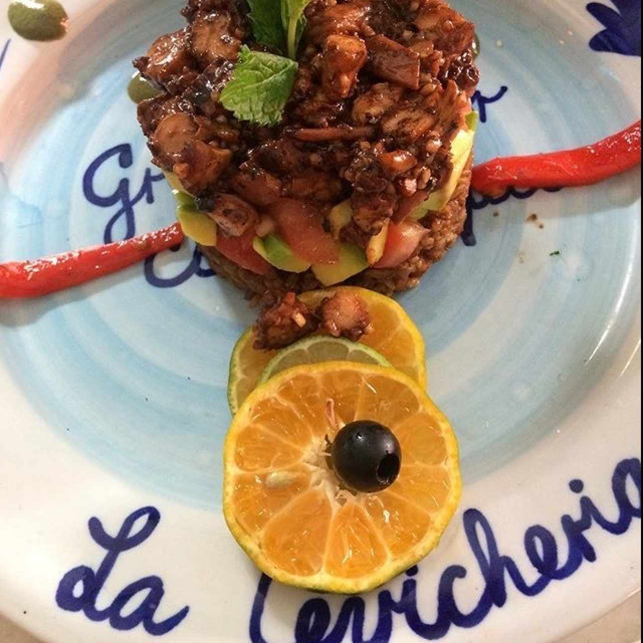 Pulpo en salsa de maní