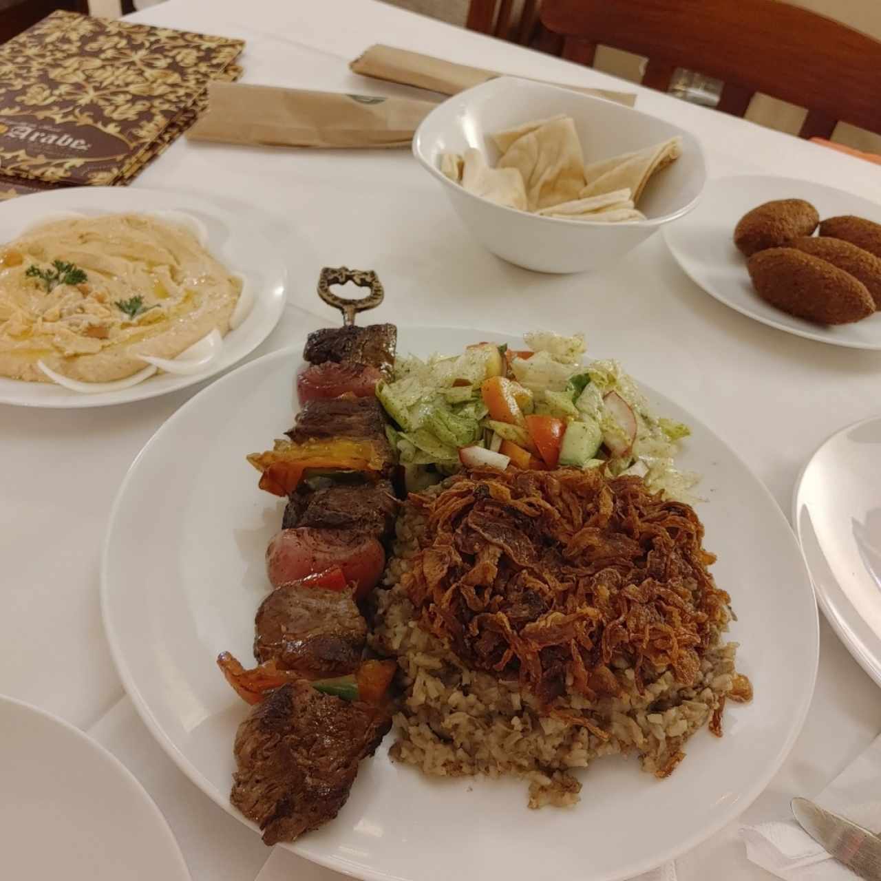 arroz lentejas con chuzo de carne