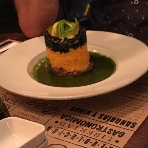 arroz con solomito y calamar