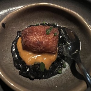 Cortesia de pescado risotto tinta de calamar