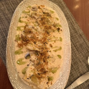 Raviolis portobello artesanales, salsa bechamel