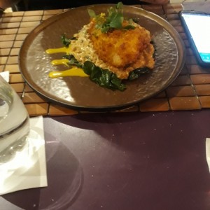 Filete pescado sobre risoto