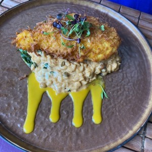 Pollo al coco con risotto de wandu. 