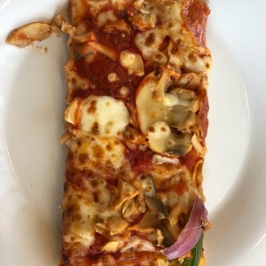 Porcion pizza con hongos
