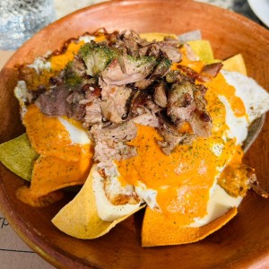 Chilaquiles de pato confitado