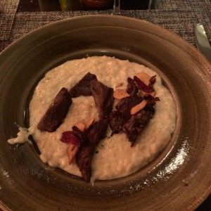 Risotto con lomito y queso parmesano