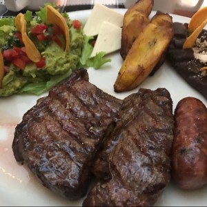 asado tipico. puyaso, longaniza y chorizo.