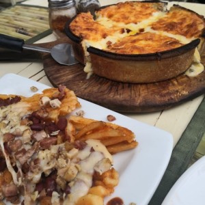 Papas supremas y pizza chicken bacon