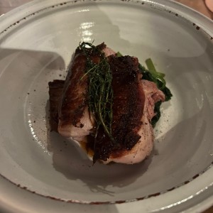 Lechon con Miloja de Papa y Acelga