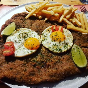 milanesa a caballo.