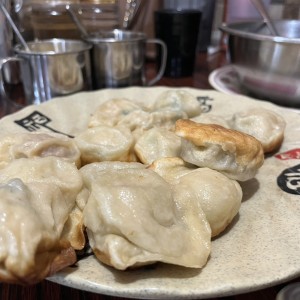 Dumplin de pollo con culantro