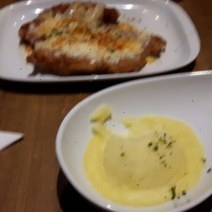 milanesa de pollo parmegiana con pure