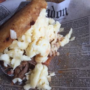 Arepa de Chicharron de Mechada con queso amarillo