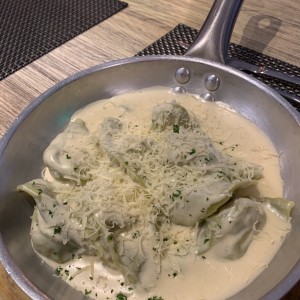 torteloni de espinacas y queso ricota