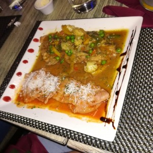 Escalopina de Cerdo del Bosque, con Raviolis Morados