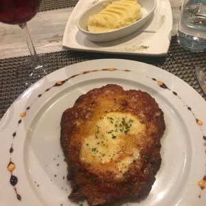 Milanesa de Res a la Parmesana.