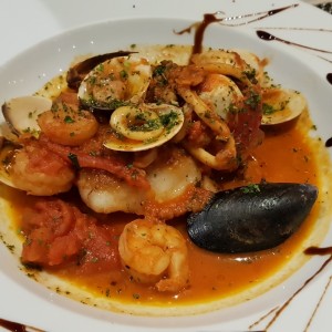 corvina con mariscos