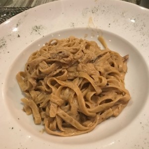Pasta servida con queso