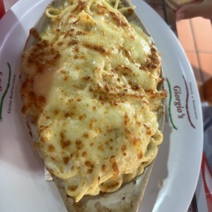 Spaghettini gratinado con salsa