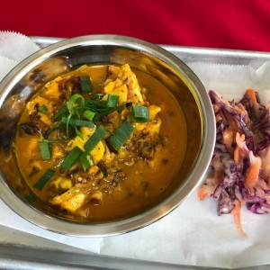 Pulpo cocido en leche de coco.