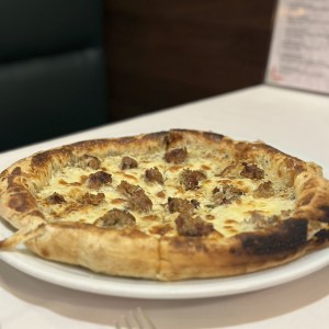 Pizza salsiccia y trufa