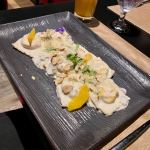 Raviolis con almendras y naranja