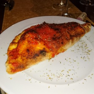 Calzoni con proscuitto y fungi