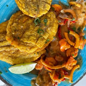 Filete de pescado en salsa de marisco