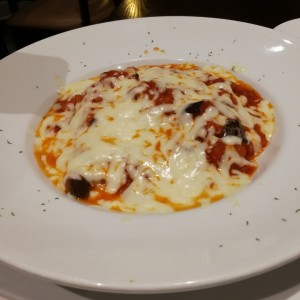 Ravioli de ricota con espinaca en salsa pomodoro