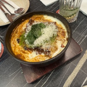 Lasagna de gallina de patio ajeno