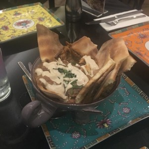 dip de berenjena asada, tomate y especies.