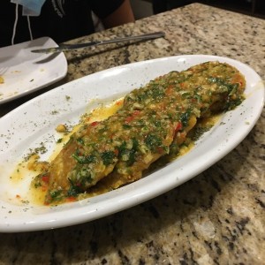 Patacones al ajillo