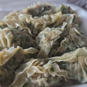 Dumpling de puerco con cebollina