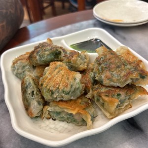 Dumpling de puerco con cebollina