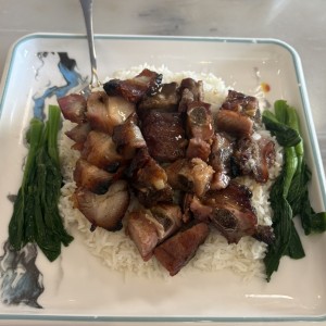 Arroz con pato y costilla asada