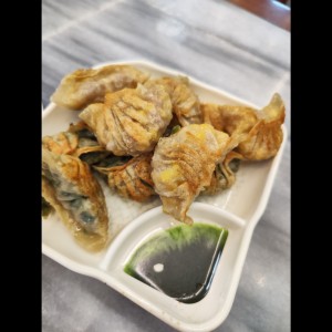 Dumpling de puerco con cebollina