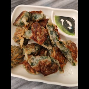 Dumpling de puerco con cebollina