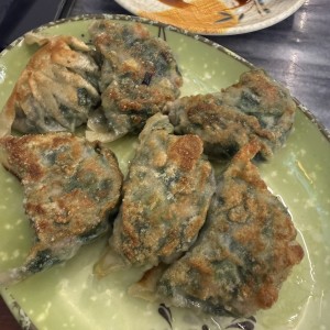 Dumpling de puerco con cebollina