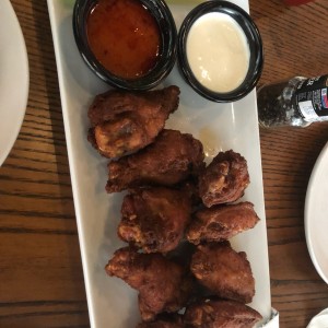 alitas y muslitos de pollo