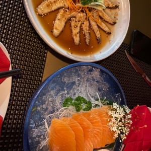 Carpacho de pulpo y sashimi de salmon