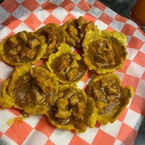 Patacones con cerdo
