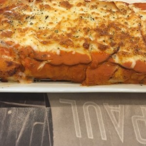 Pizza jamon con queso.