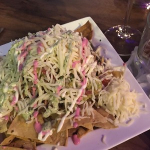 media orden de nachos con carne