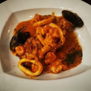 Pescado con mariscos