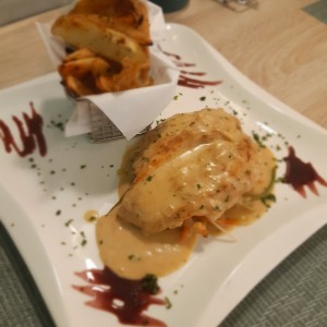 Pechuga de pollo en cama de vegetales
