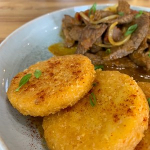 Bisteck encebollado