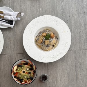 Ravioli en crema de hongos