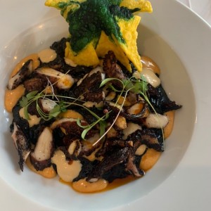 Pulpo con arroz meloso