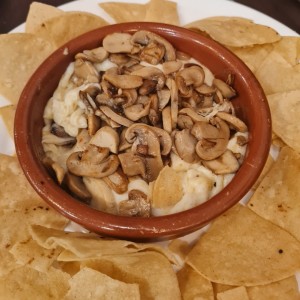 queso fundido con hongos