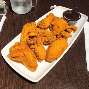 Fosters Wings con Papas